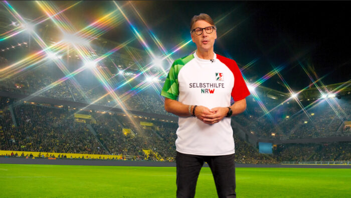 Screenshot Erklärfilm Peter Großmann vor BVB-Kulisse